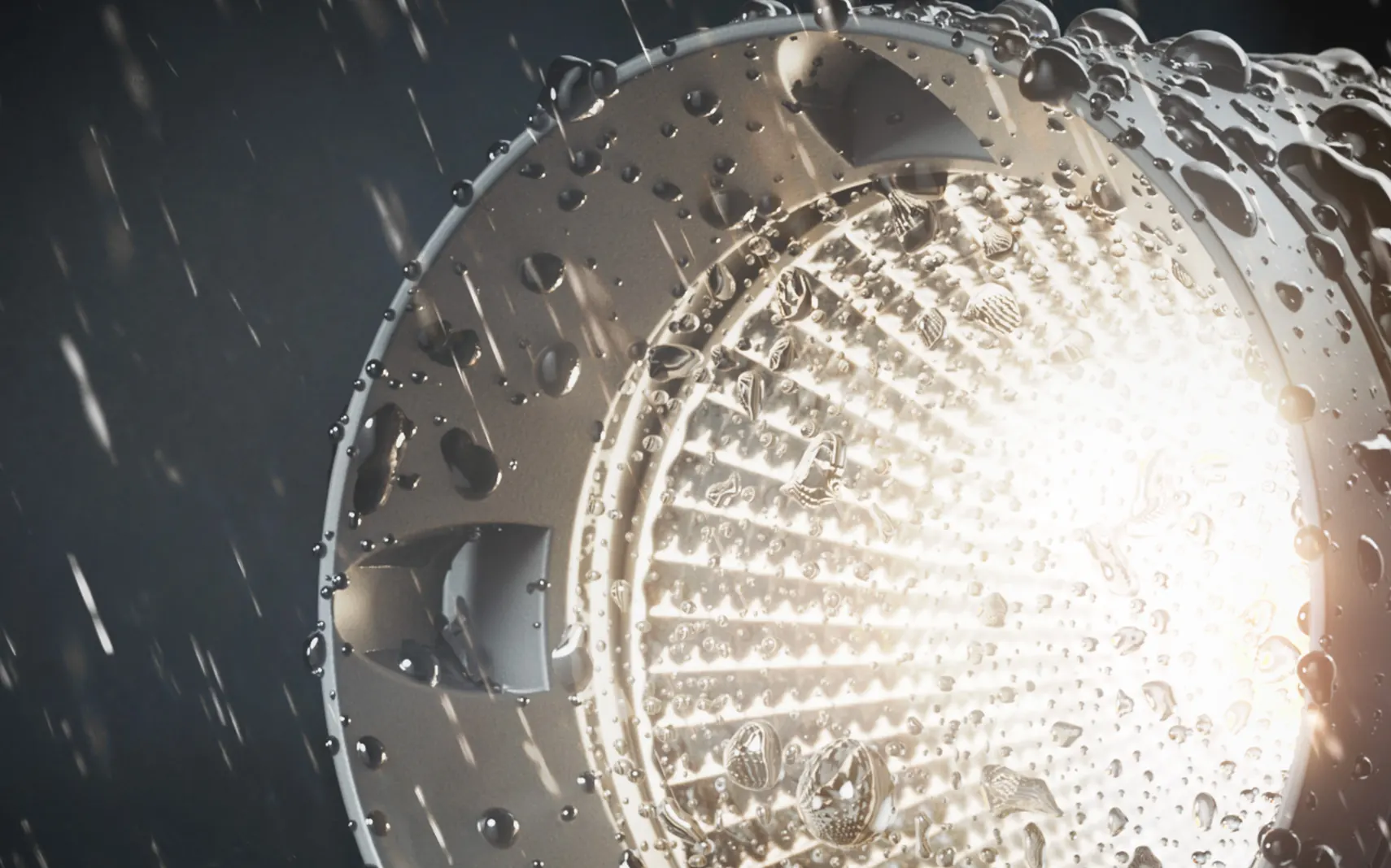 Close view of a lit HK lens with water droplets